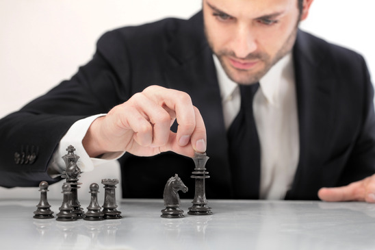Businessman Playing Chess